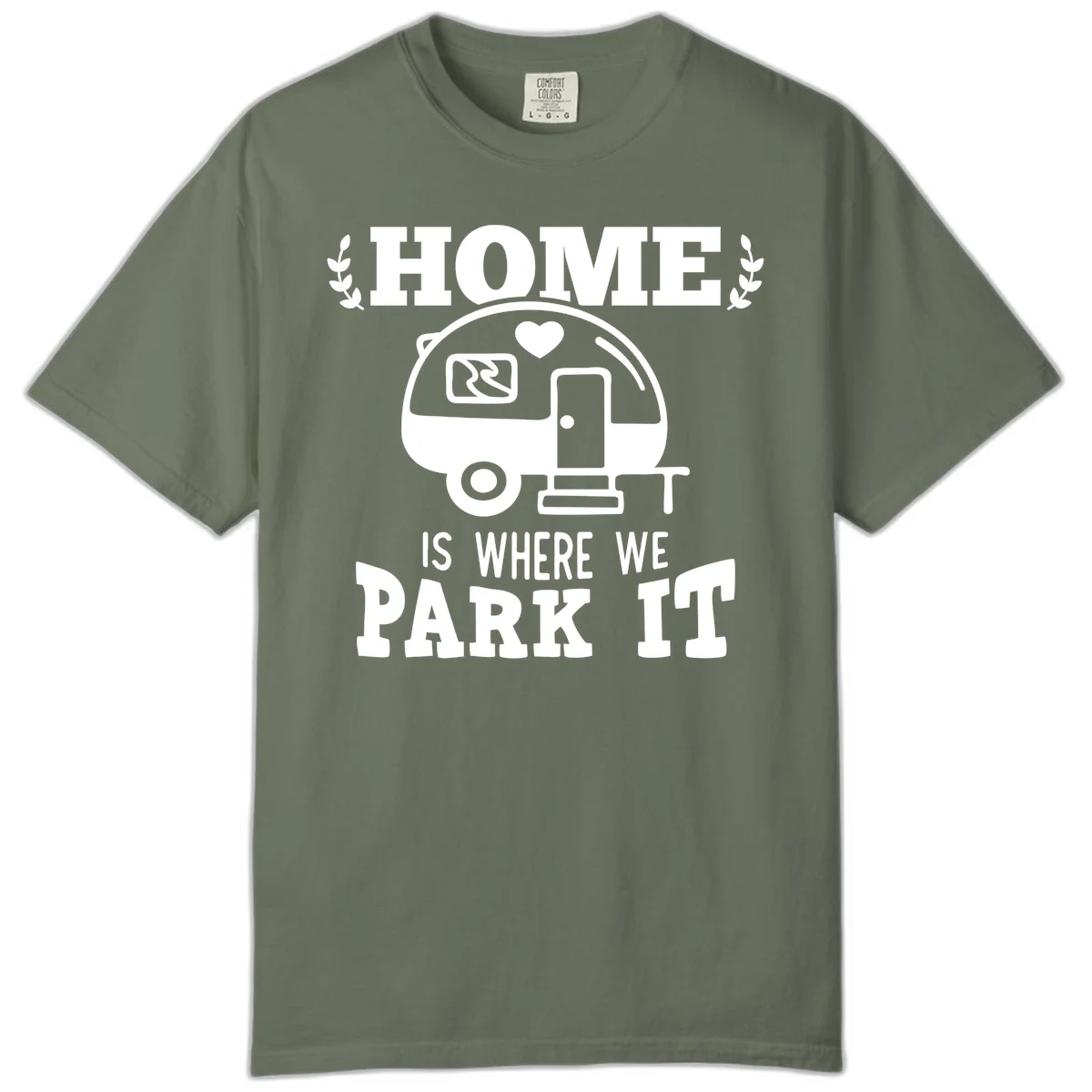 Vintage travel trailer illustration with 'Home Is Where We Park It' text and laurel wreaths on gray background in Moss