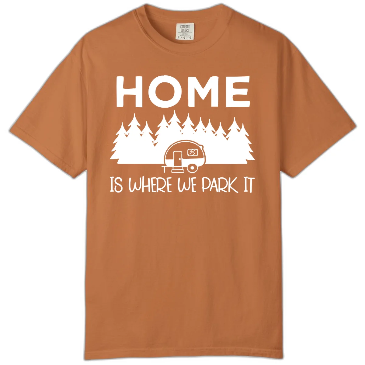 Home is where we park it design with travel trailer and forest trees on gray background in Yam
