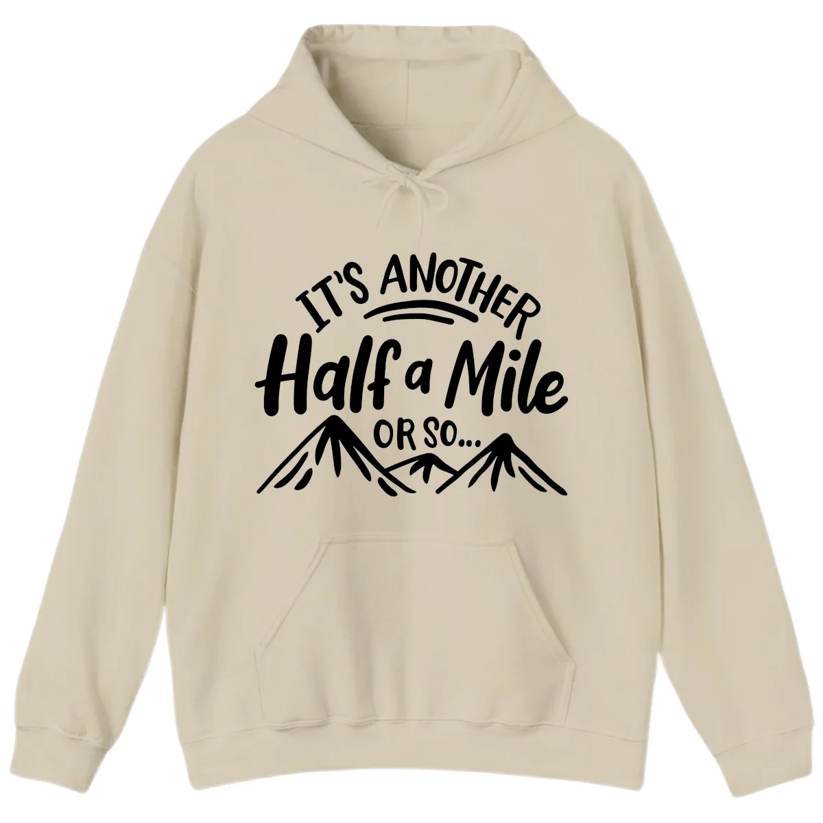 White text reading 'It's Another Half a Mile Or So...' with illustrated snow-capped mountains below on gray background in Sand