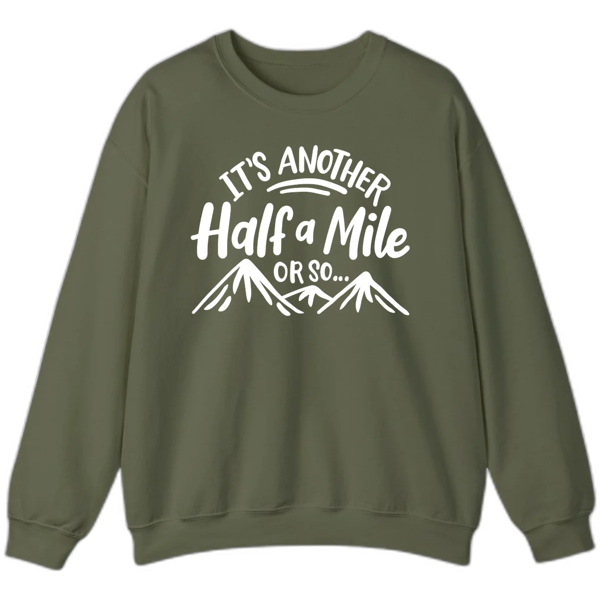 White text reading 'It's Another Half a Mile Or So...' with illustrated snow-capped mountains below on gray background in Military Green