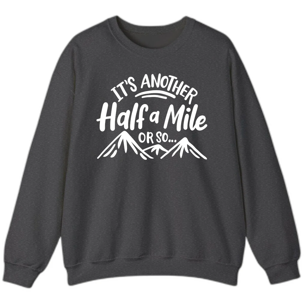 White text reading 'It's Another Half a Mile Or So...' with illustrated snow-capped mountains below on gray background in Dark Heather