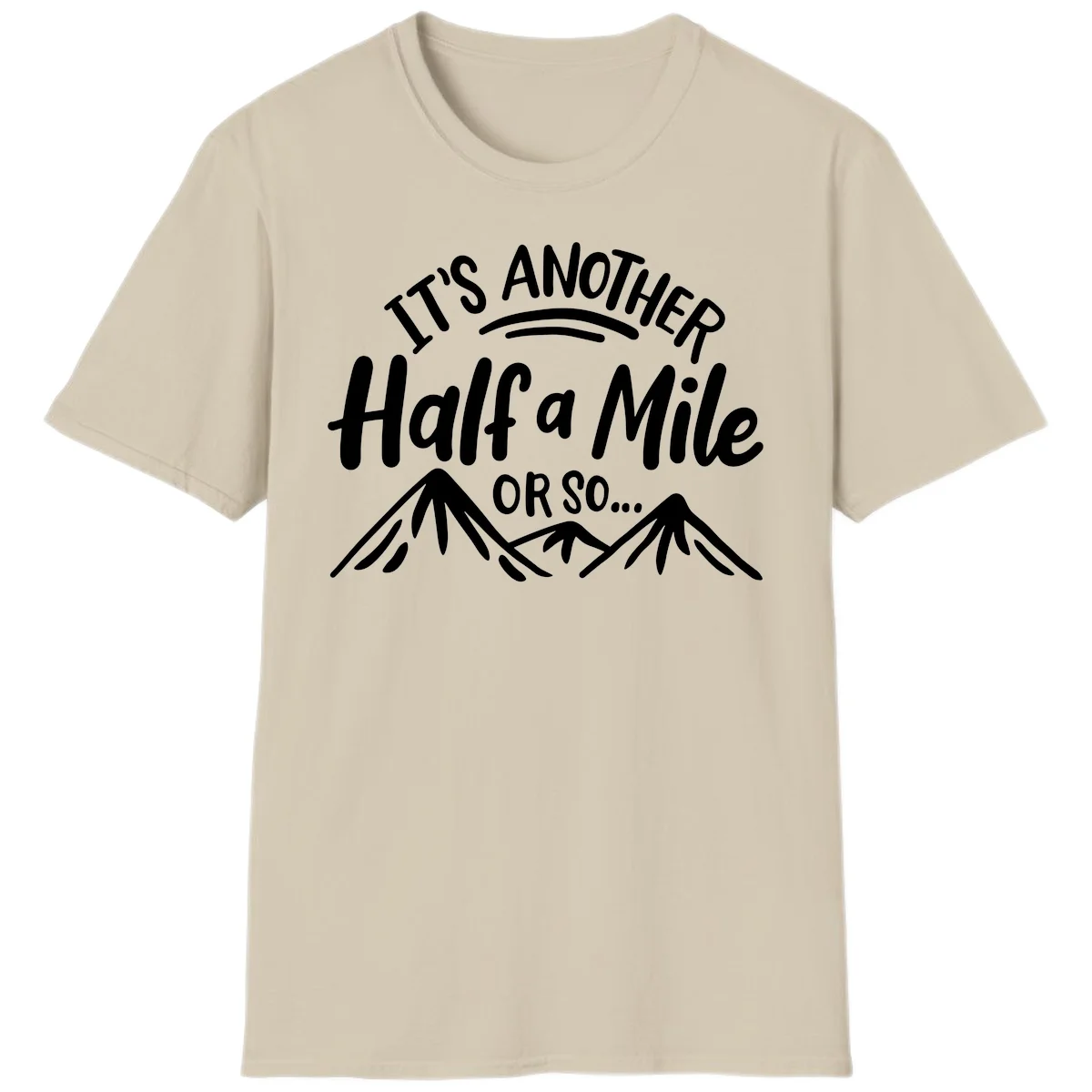 White text reading 'It's Another Half a Mile Or So...' with illustrated snow-capped mountains below on gray background in Sand