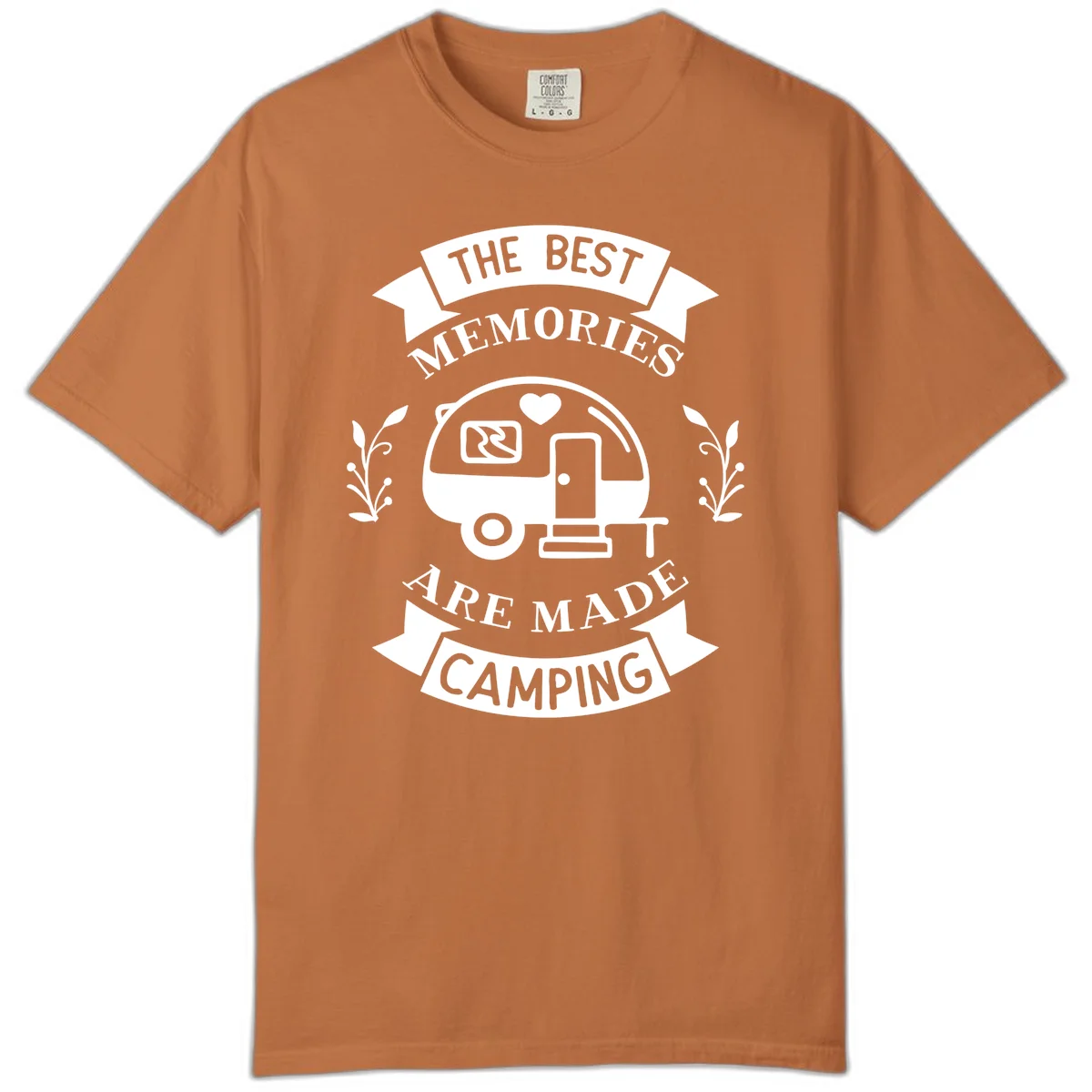 Vintage badge design with travel trailer and heart, text reading 'The Best Memories Are Made Camping' with decorative botanical branches in Yam