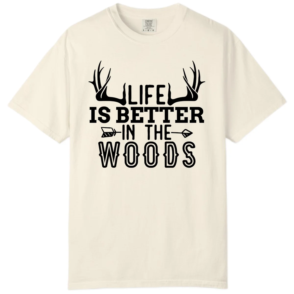 White text reading 'Life Is Better In The Woods' with deer antlers and arrows on gray background in Ivory
