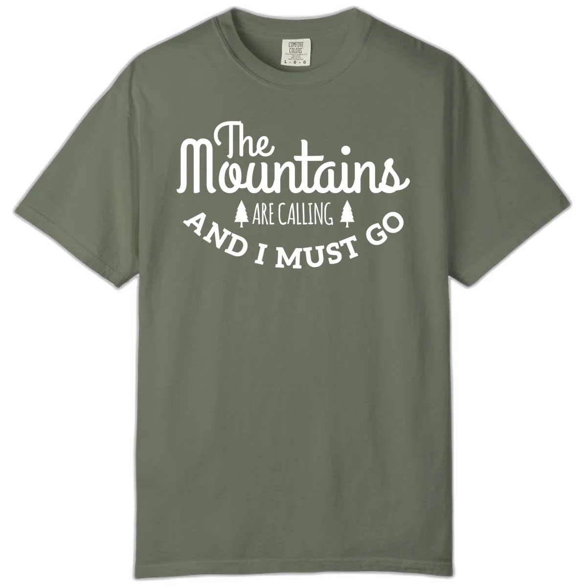 White text reading "The Mountains Are Calling And I Must Go" with pine trees on gray background in Moss