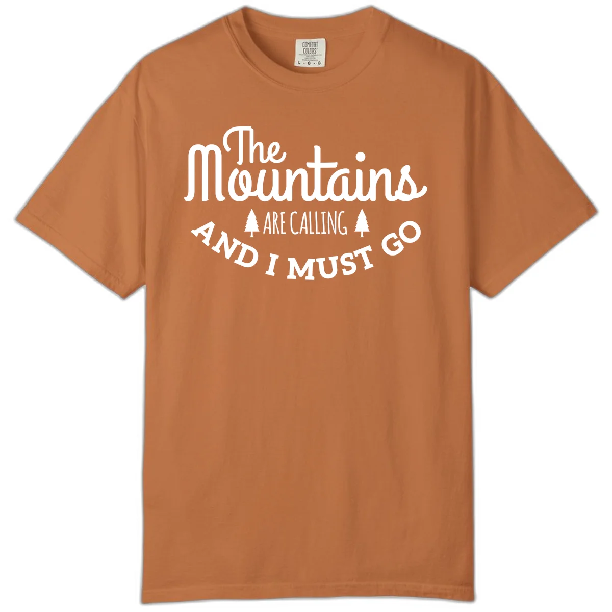 White text reading "The Mountains Are Calling And I Must Go" with pine trees on gray background in Yam