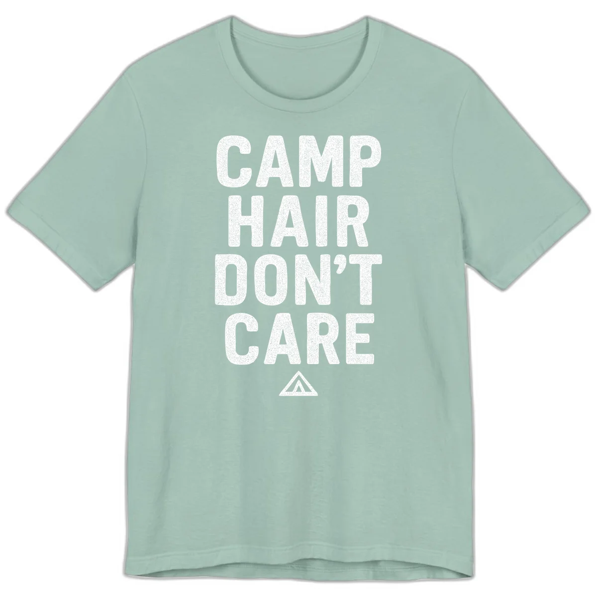 White speckled text reading 'Camp Hair Don't Care' with triangle symbol on gray background in Dusty Blue