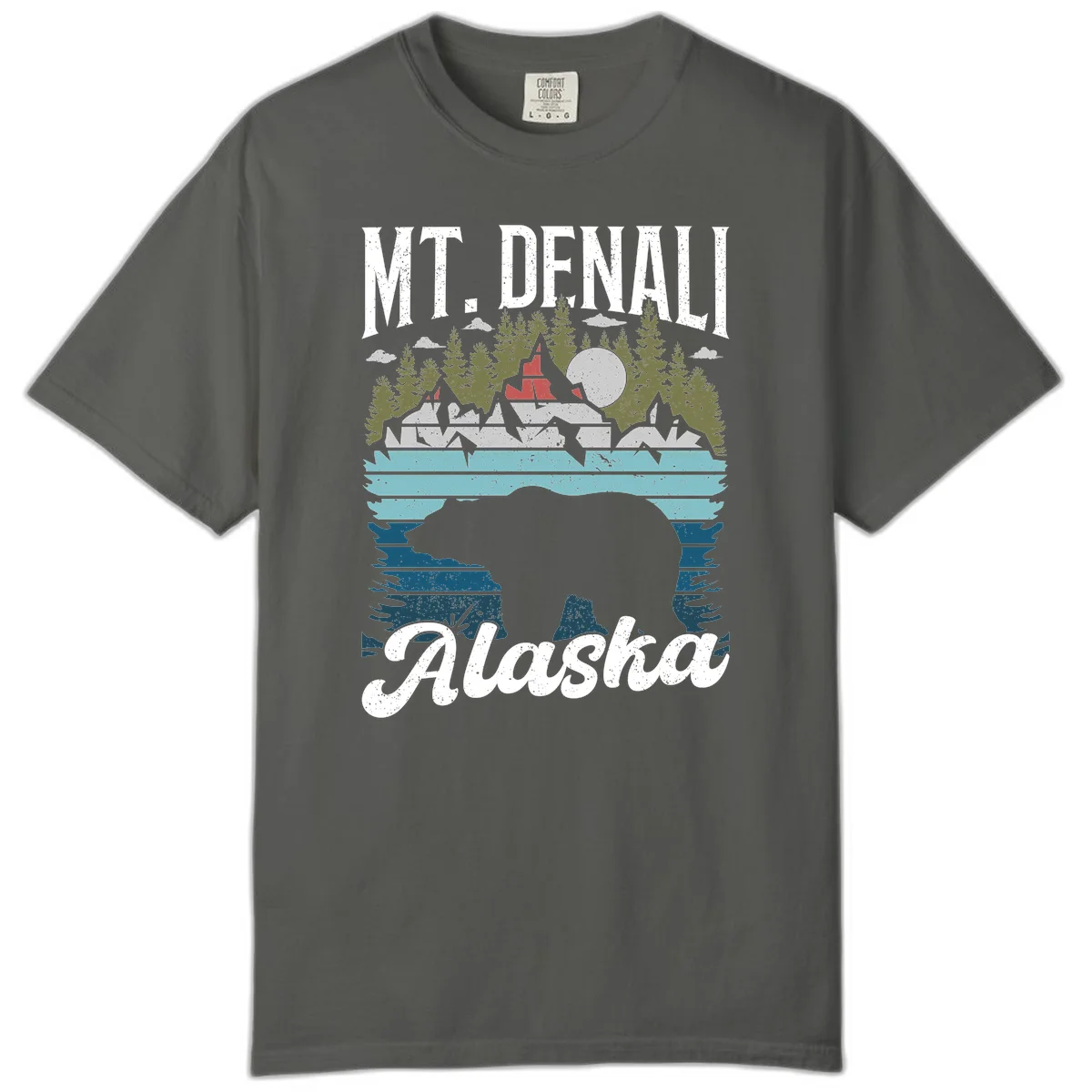 Denali bear Alaska design: layered illustration with silhouetted bear emerging from water, mountain peaks, fortress, forest, and full moon. in Pepper