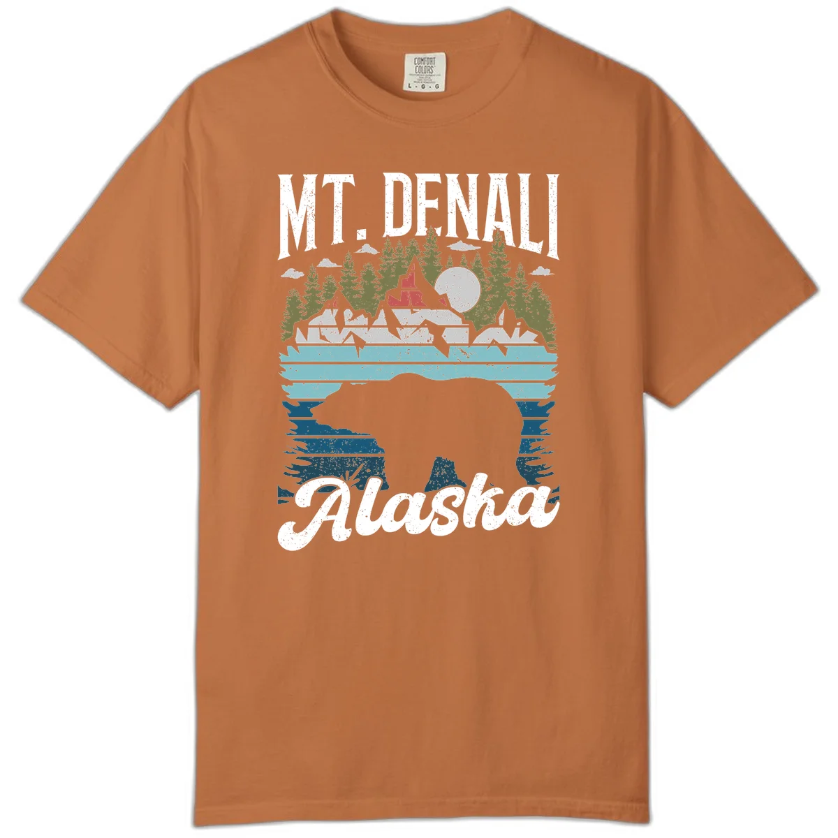 Denali bear Alaska design: layered illustration with silhouetted bear emerging from water, mountain peaks, fortress, forest, and full moon. in Yam