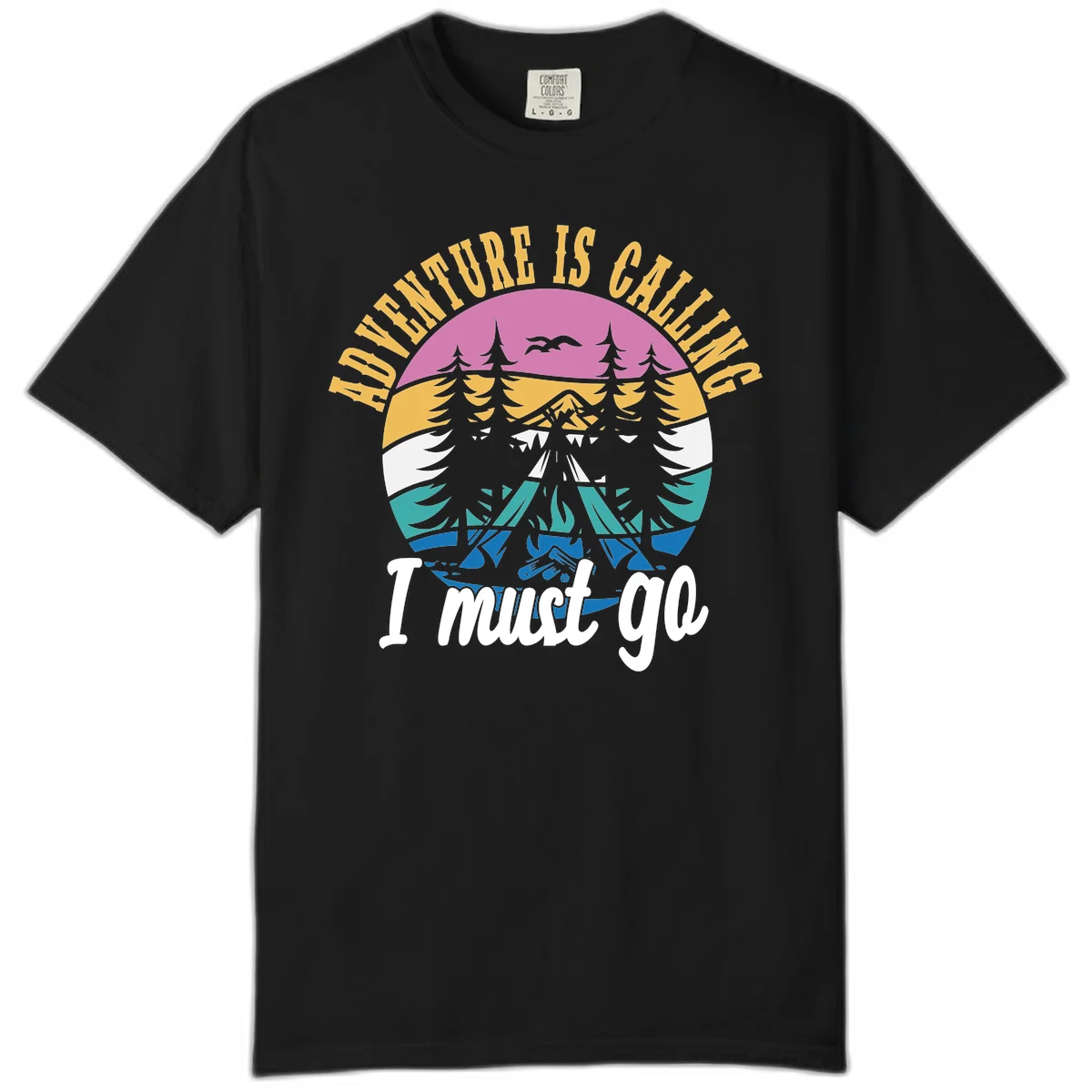 Circular badge with mountain landscape, evergreen trees, and flying birds in pink, gold, white, teal and blue with text 'Adventure Is Calling I Must Go' in Black