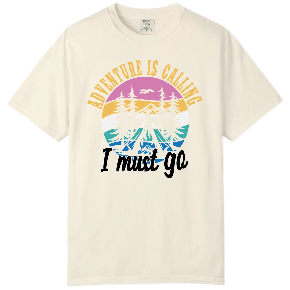 Circular badge with mountain landscape, evergreen trees, and flying birds in pink, gold, white, teal and blue with text 'Adventure Is Calling I Must Go' in Ivory