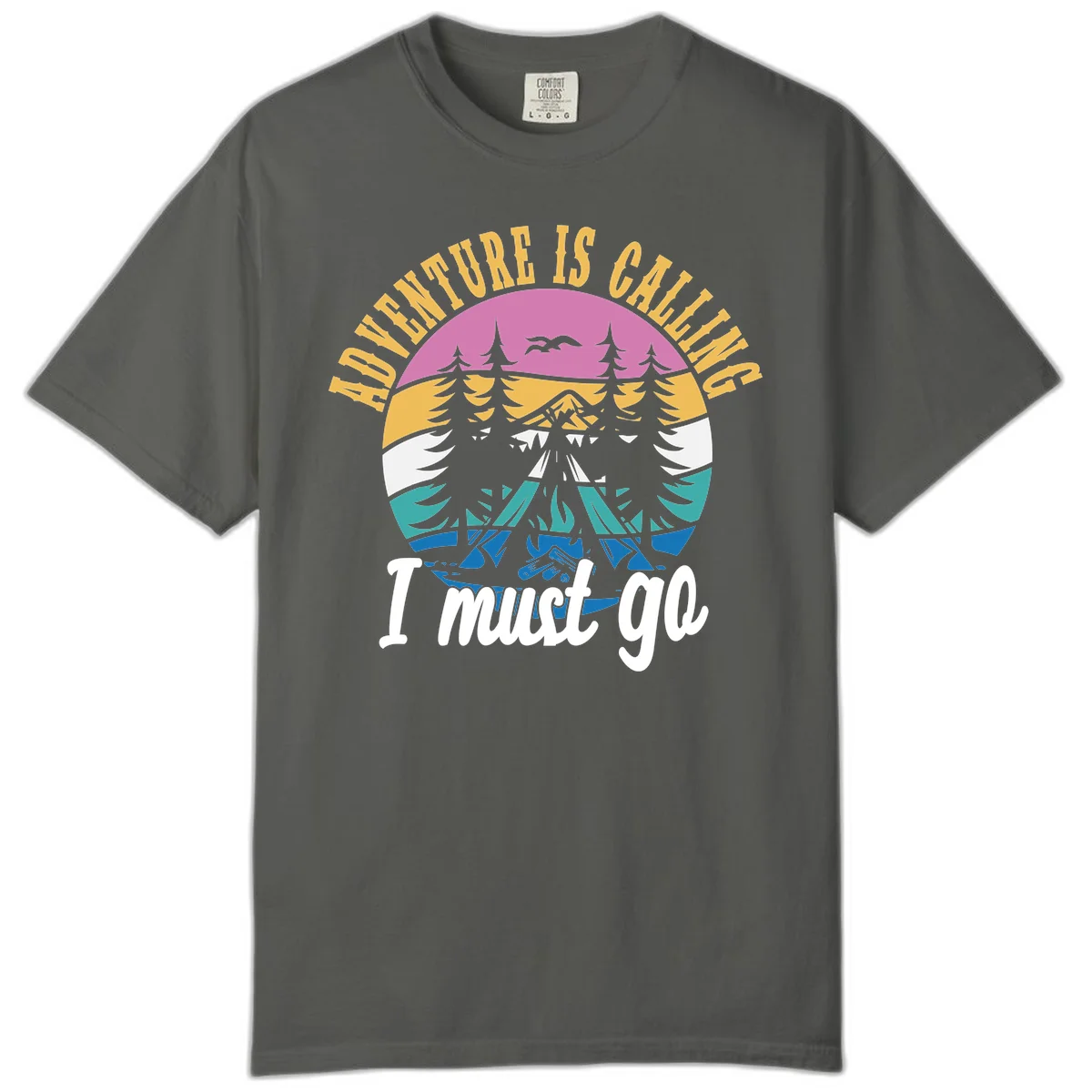 Circular badge with mountain landscape, evergreen trees, and flying birds in pink, gold, white, teal and blue with text 'Adventure Is Calling I Must Go' in Pepper