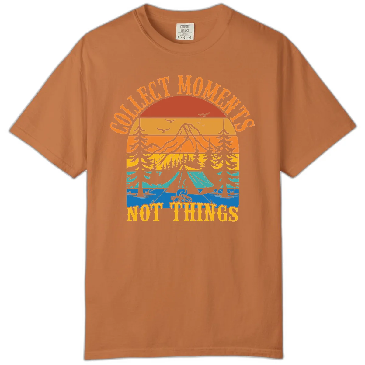 Retro layered landscape showing sunset, mountains, forest, tent and campfire with 'Quiet Mornings Not Things' text in Yam