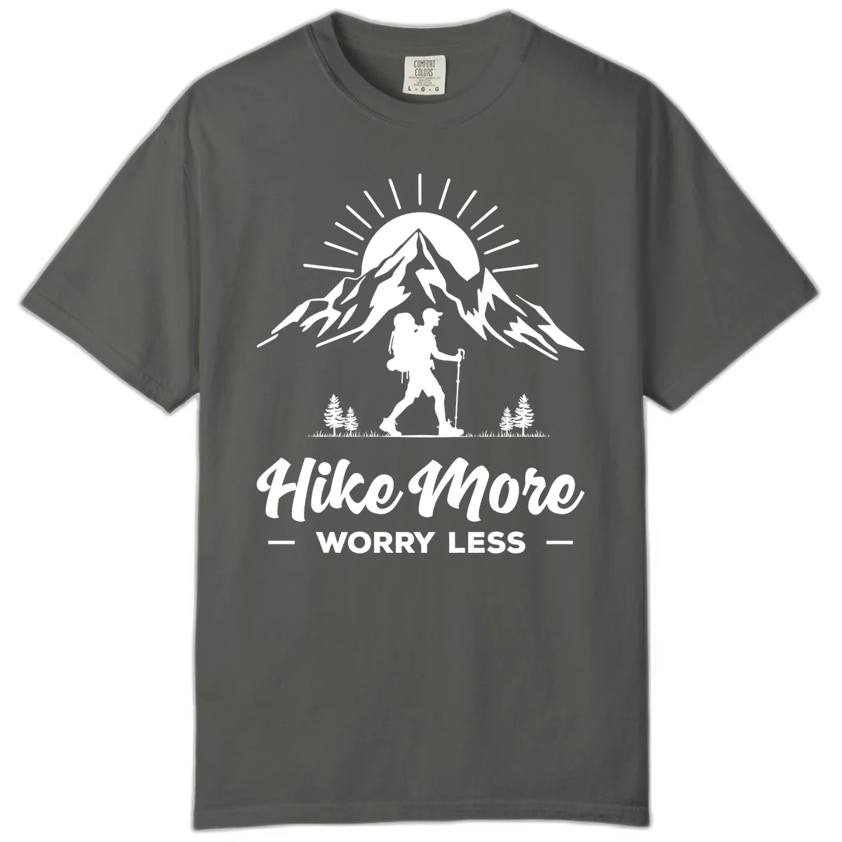 Silhouette of hiker with backpack and poles facing snow-capped mountain with radiating sun, evergreen trees below, text reads 'Hike More Worry Less' in Pepper