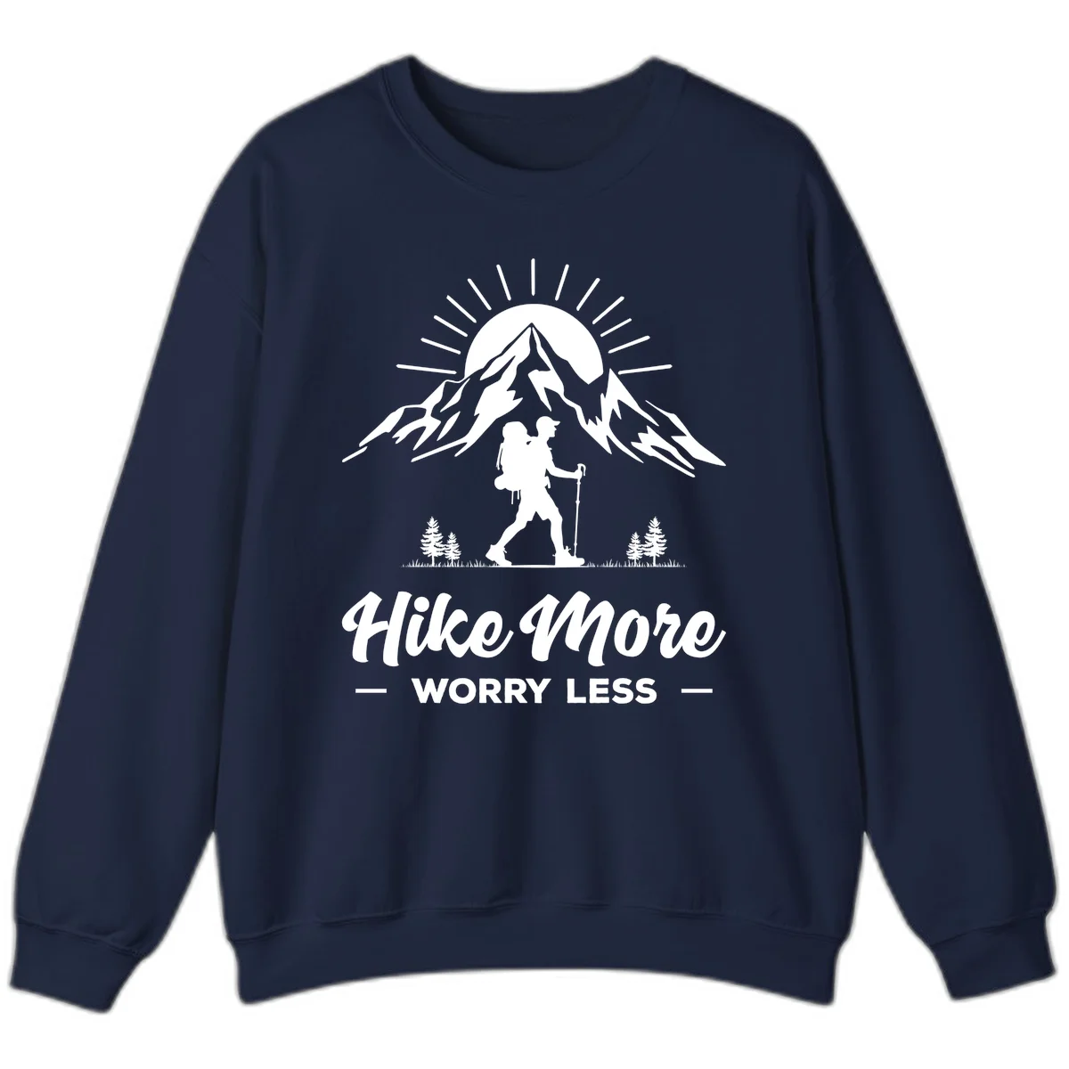 Silhouette of hiker with backpack and poles facing snow-capped mountain with radiating sun, evergreen trees below, text reads 'Hike More Worry Less' in Navy