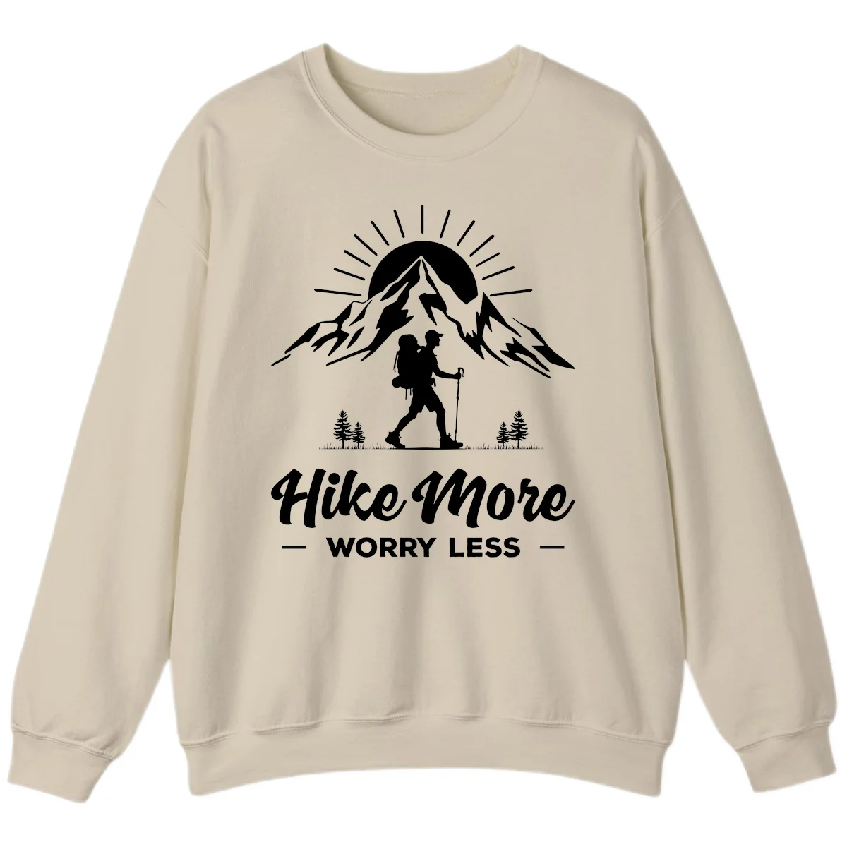 Silhouette of hiker with backpack and poles facing snow-capped mountain with radiating sun, evergreen trees below, text reads 'Hike More Worry Less' in Sand