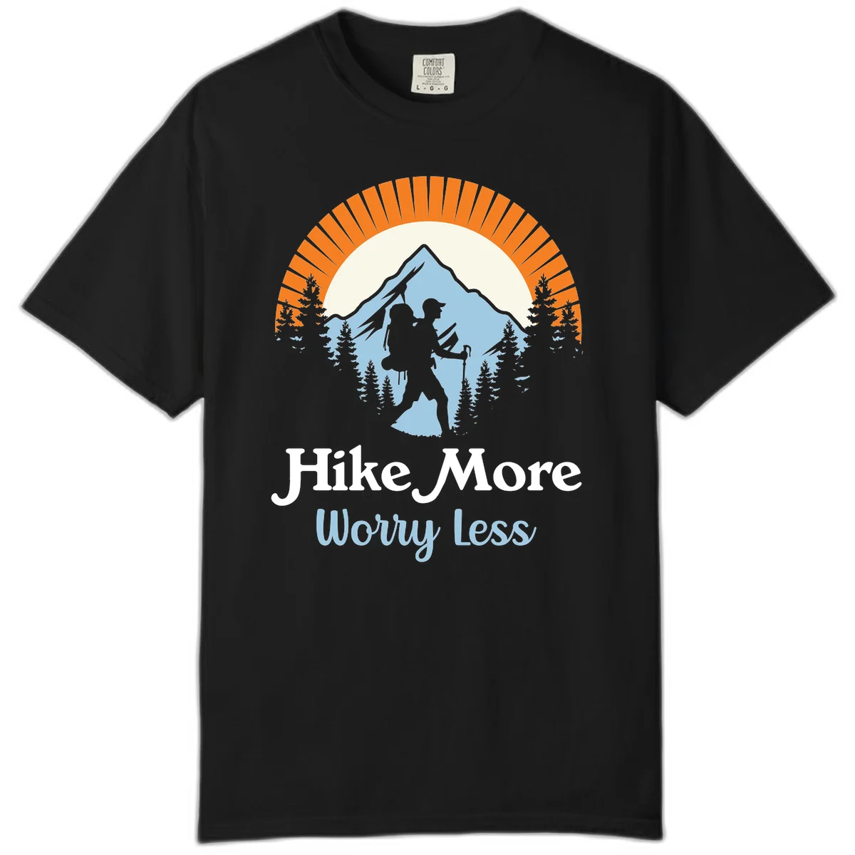 Hike more worry less badge design with silhouetted hiker, mountain peak, and evergreen forest in circular composition. in Black