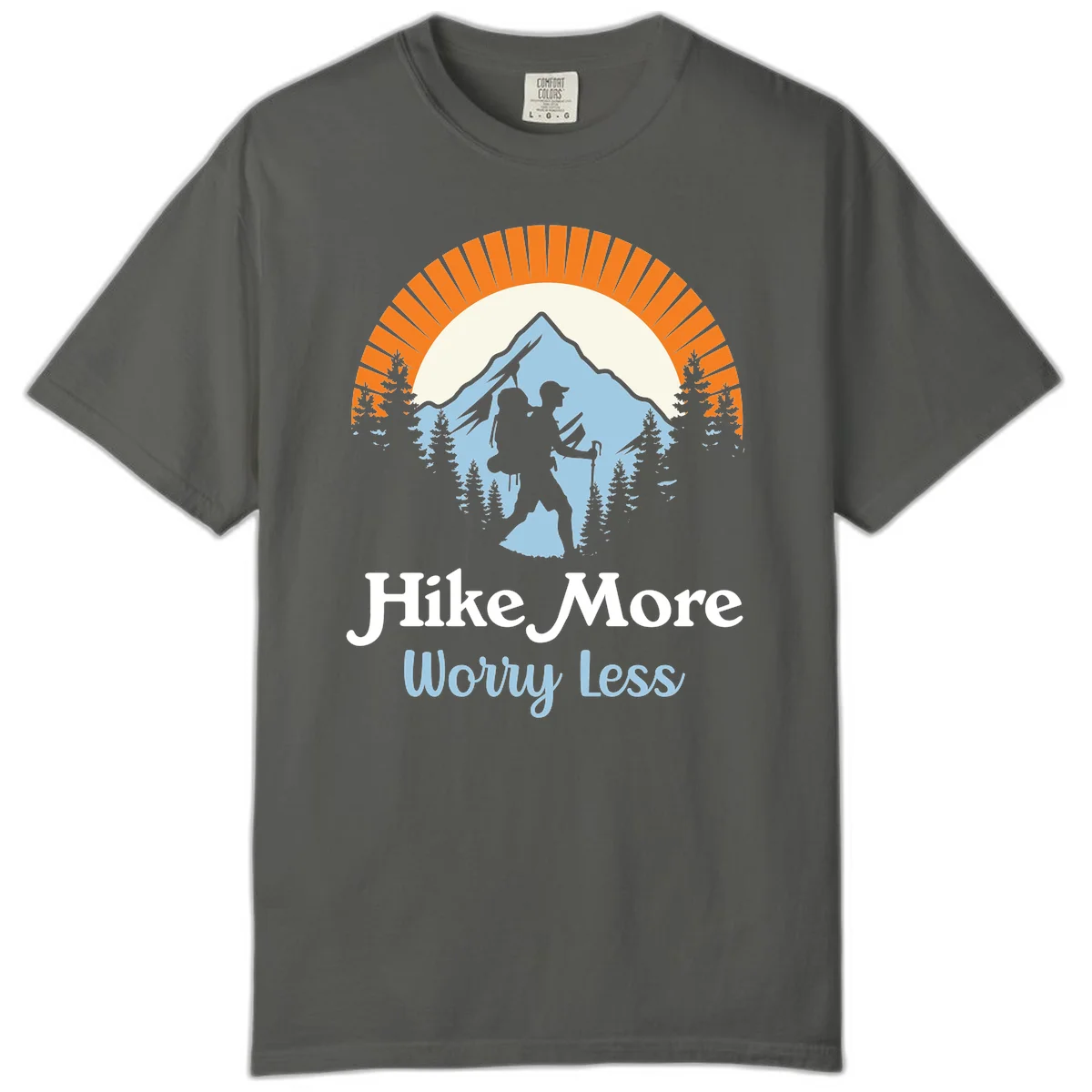 Hike more worry less badge design with silhouetted hiker, mountain peak, and evergreen forest in circular composition. in Pepper