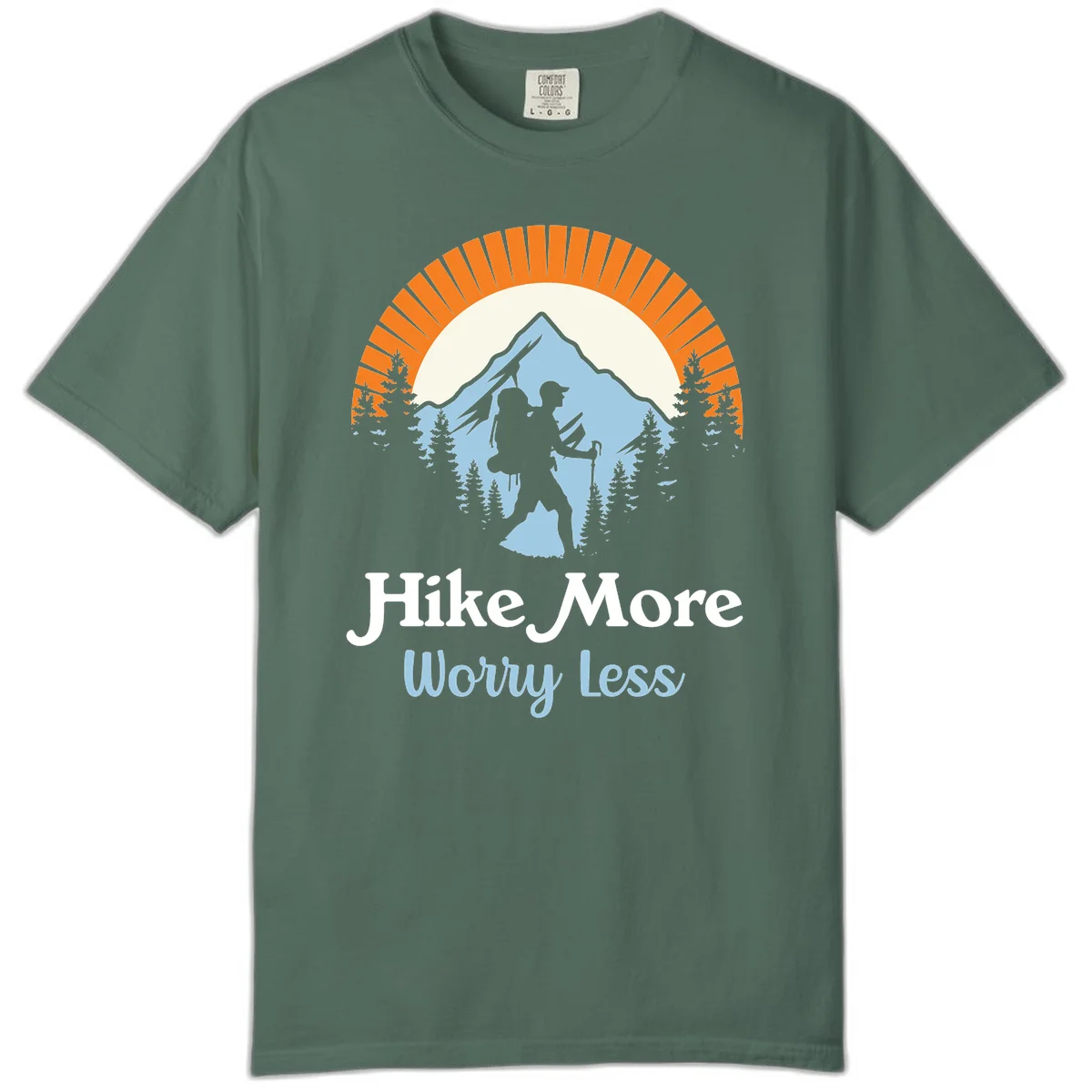Hike more worry less badge design with silhouetted hiker, mountain peak, and evergreen forest in circular composition. in Blue Spruce