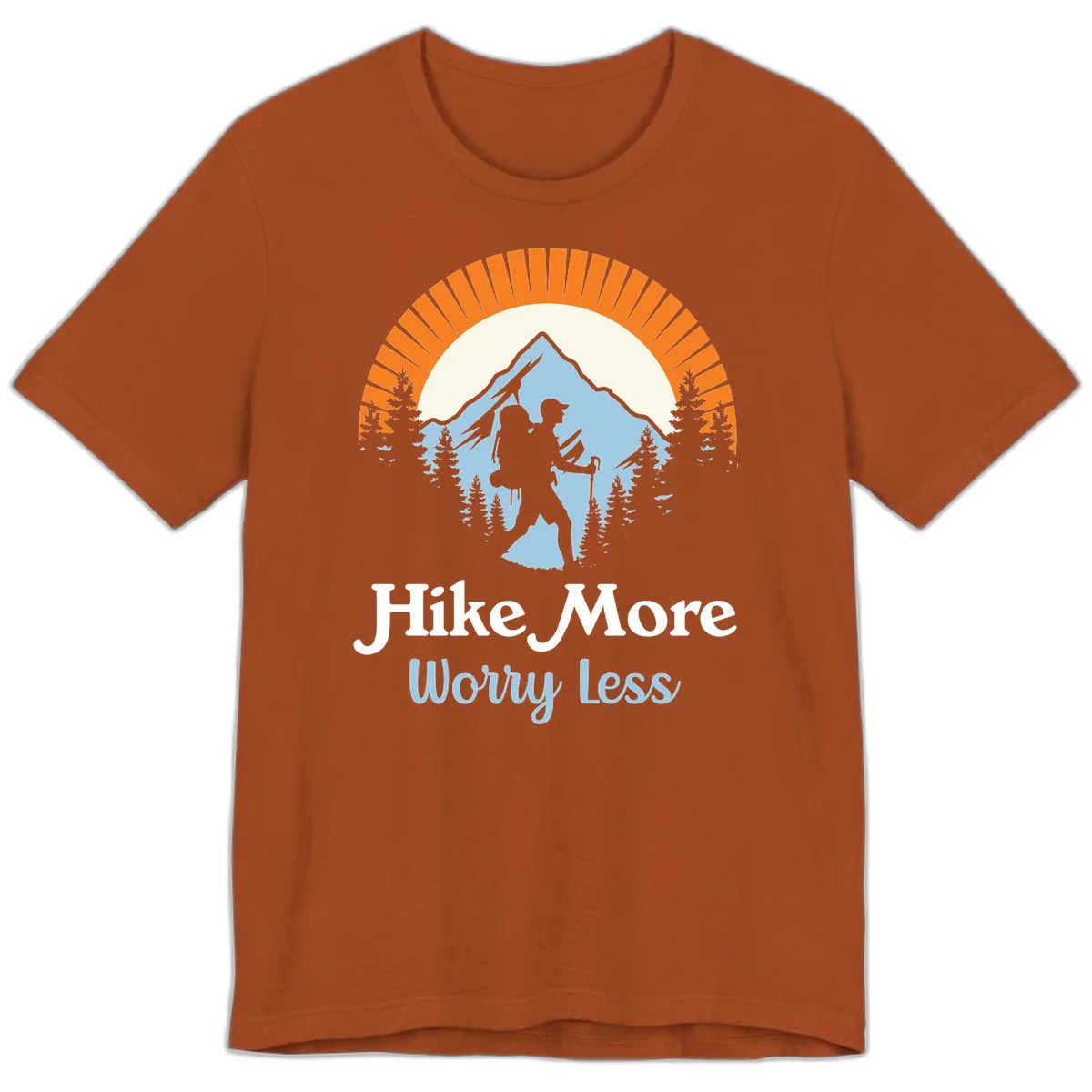 Hike more worry less badge design with silhouetted hiker, mountain peak, and evergreen forest in circular composition. in Autumn