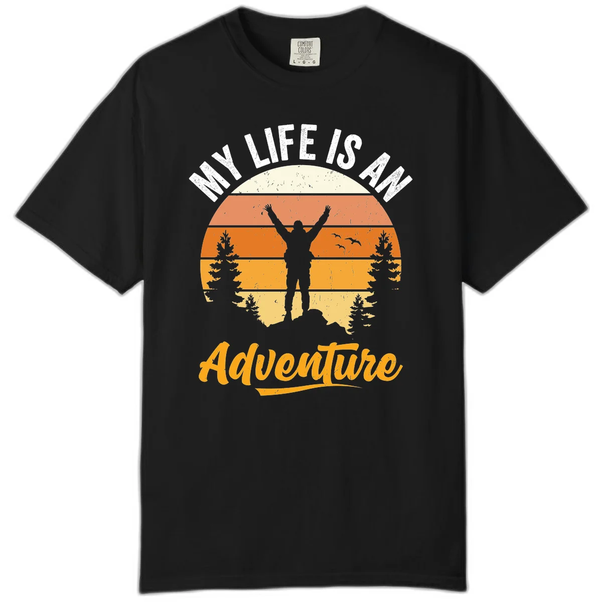Retro sunset illustration with silhouette of person celebrating arms raised, evergreen trees and mountains, text 'My Life Is An Adventure' in Black