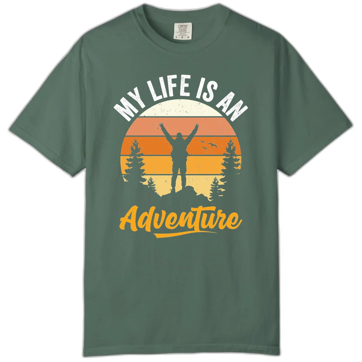 Retro sunset illustration with silhouette of person celebrating arms raised, evergreen trees and mountains, text 'My Life Is An Adventure' in Blue Spruce