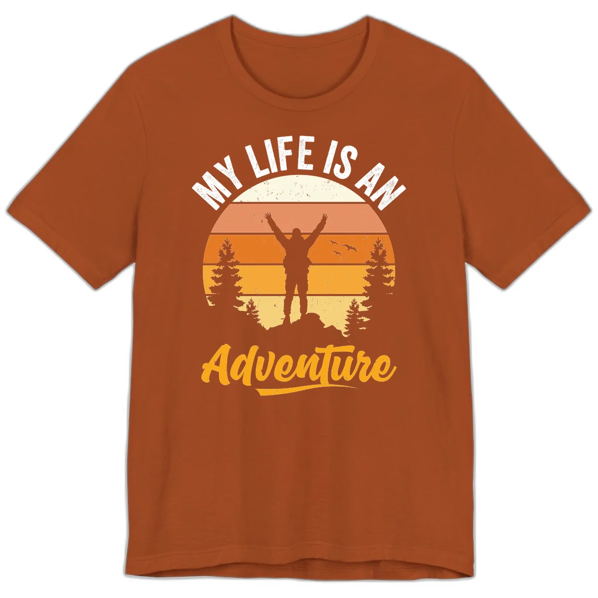 Retro sunset illustration with silhouette of person celebrating arms raised, evergreen trees and mountains, text 'My Life Is An Adventure' in Autumn