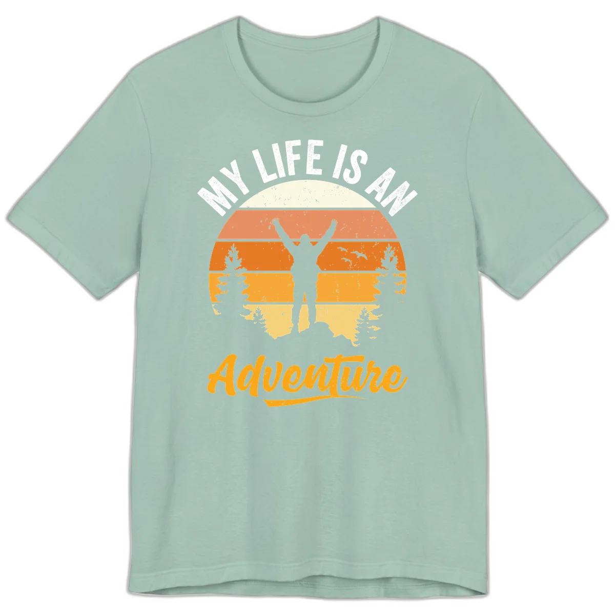 Retro sunset illustration with silhouette of person celebrating arms raised, evergreen trees and mountains, text 'My Life Is An Adventure' in Dusty Blue