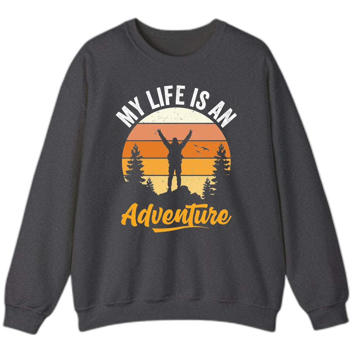 Retro sunset illustration with silhouette of person celebrating arms raised, evergreen trees and mountains, text 'My Life Is An Adventure' in Dark Heather