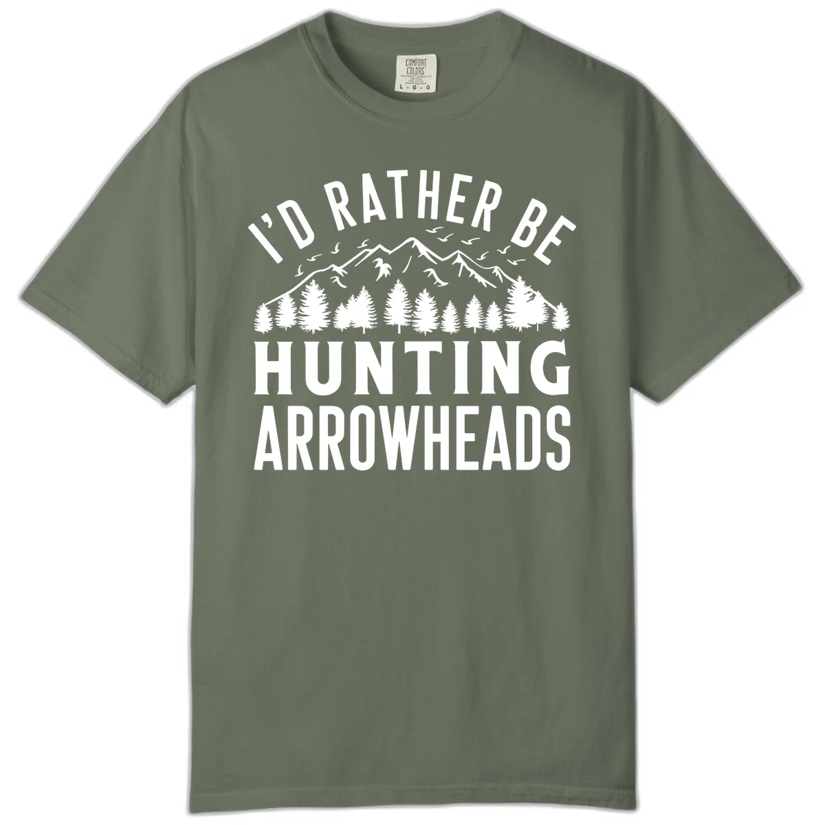 Mountain landscape with evergreen trees and birds, white text reading 'I'd Rather Be Hunting Arrowheads' on gray background in Moss