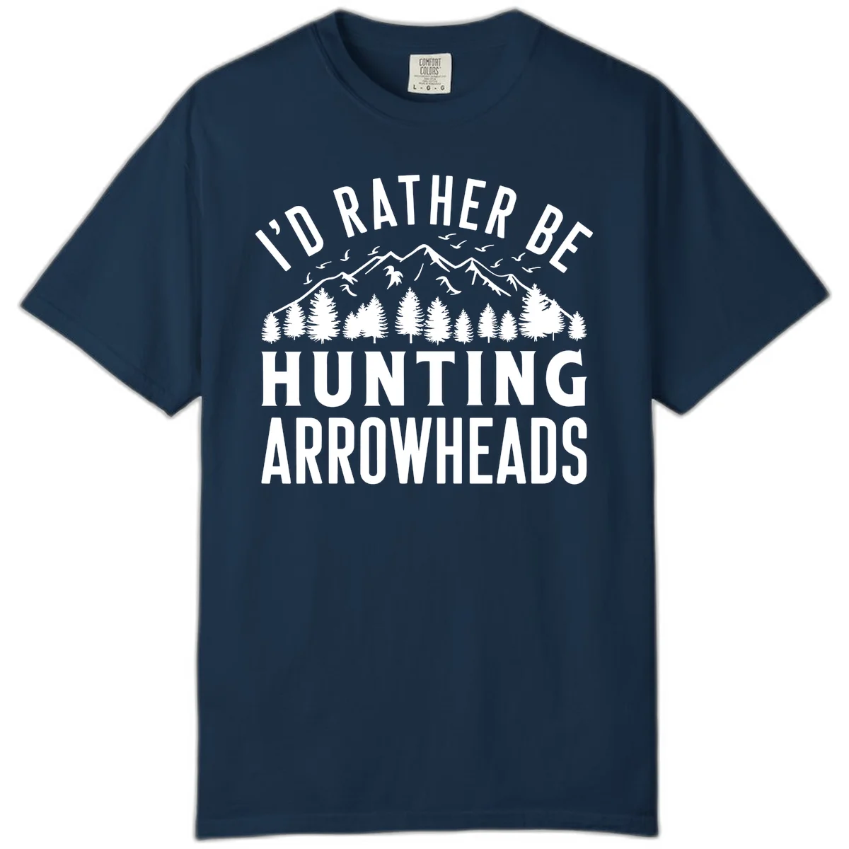Mountain landscape with evergreen trees and birds, white text reading 'I'd Rather Be Hunting Arrowheads' on gray background in True Navy