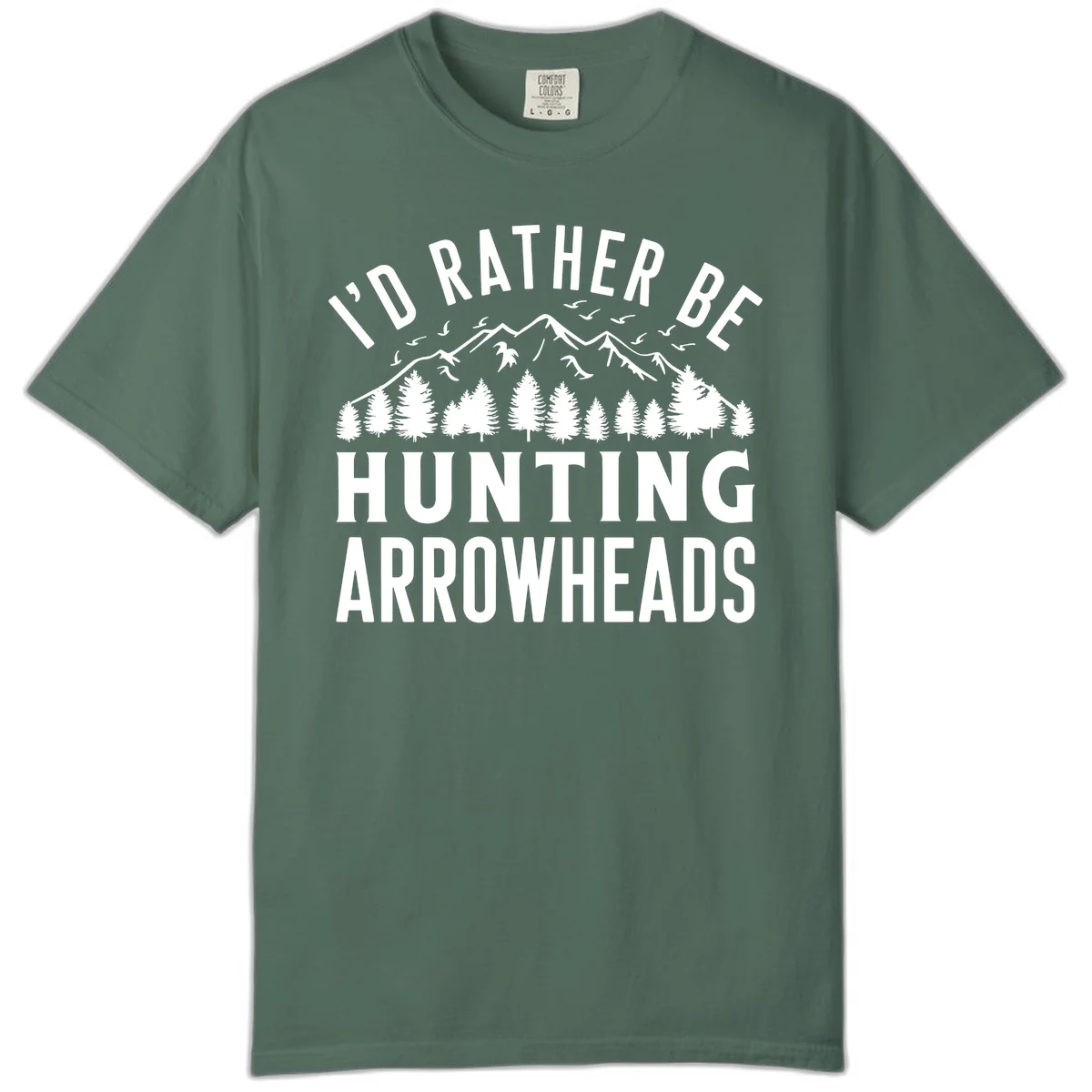 Mountain landscape with evergreen trees and birds, white text reading 'I'd Rather Be Hunting Arrowheads' on gray background in Blue Spruce