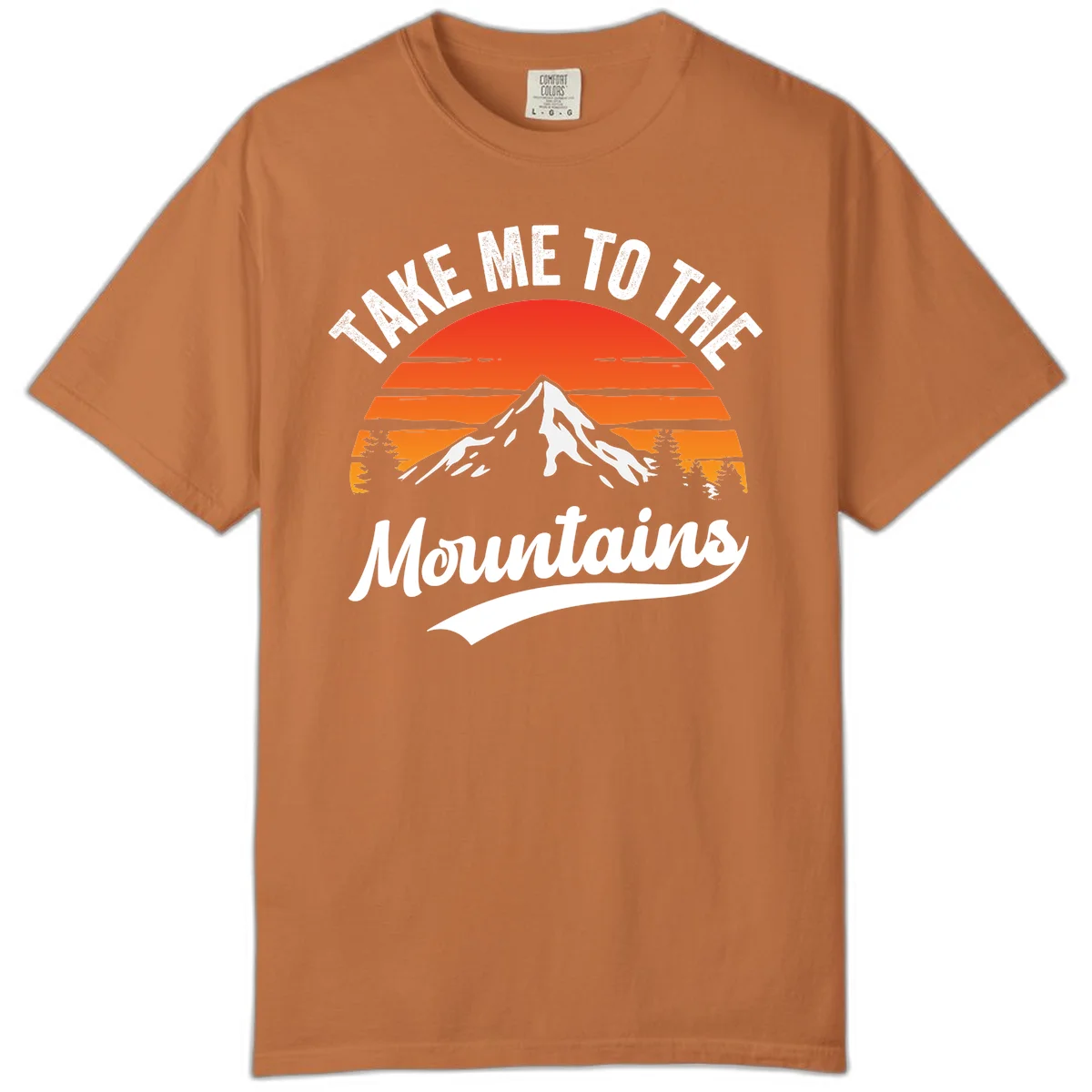 Vintage-style illustration of snow-capped mountain with sunset stripes and evergreen trees, text reading 'Take Me To The Mountains' in Yam