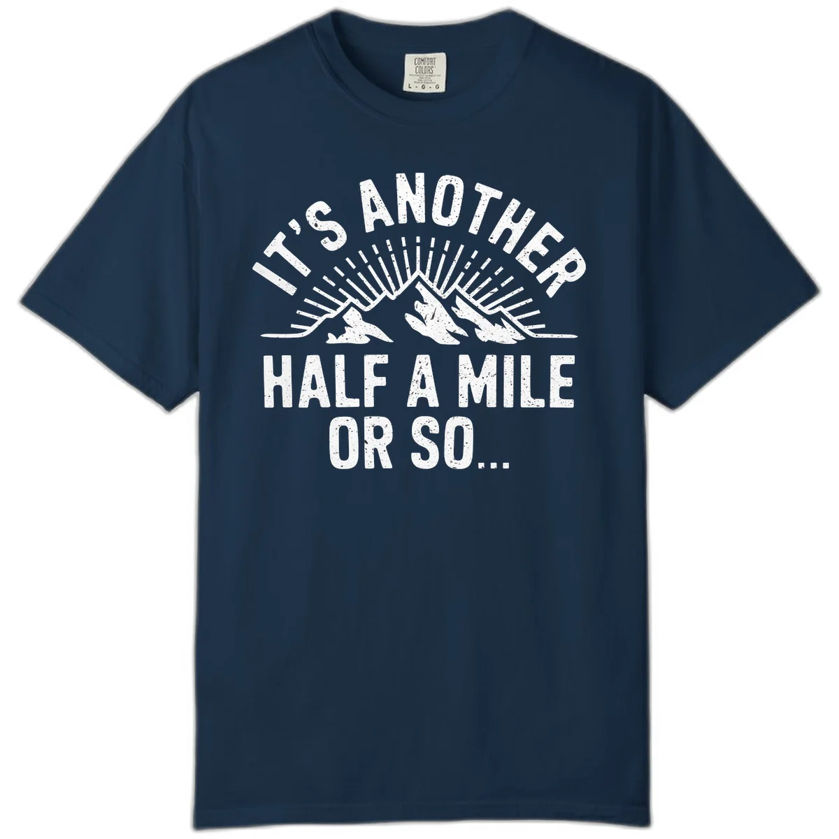 Retro distressed design with mountain peaks and sun rays, text reads 'It's Another Half A Mile Or So' - humorous hiking and camping artwork in True Navy