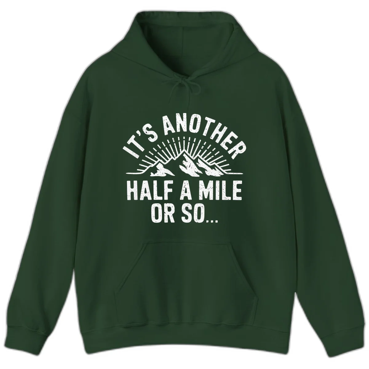 Retro distressed design with mountain peaks and sun rays, text reads 'It's Another Half A Mile Or So' - humorous hiking and camping artwork in Forest Green