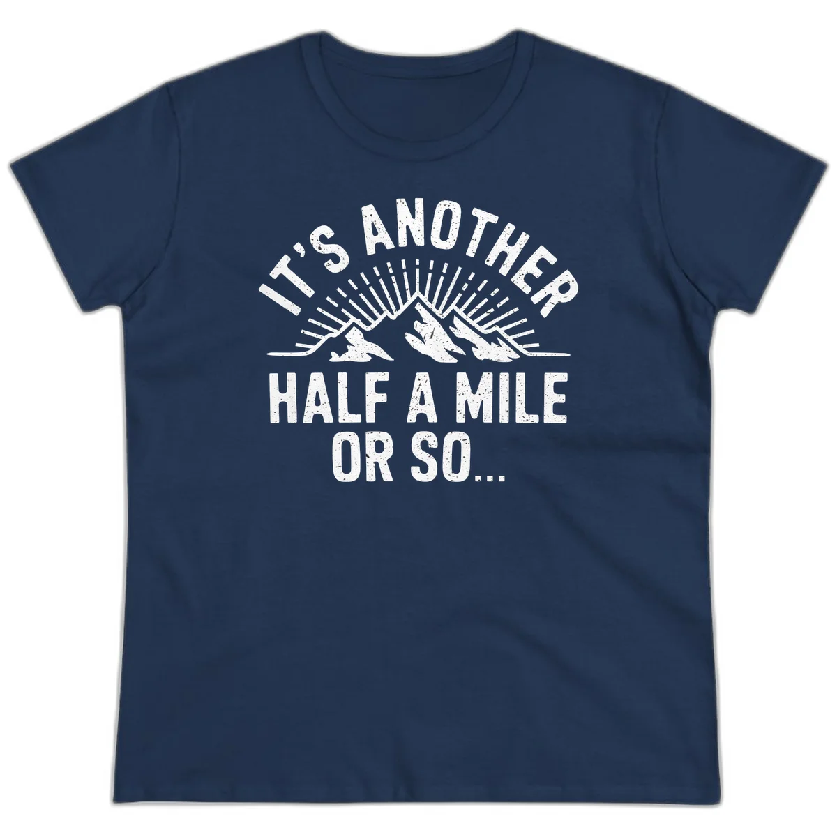 Retro distressed design with mountain peaks and sun rays, text reads 'It's Another Half A Mile Or So' - humorous hiking and camping artwork in Navy