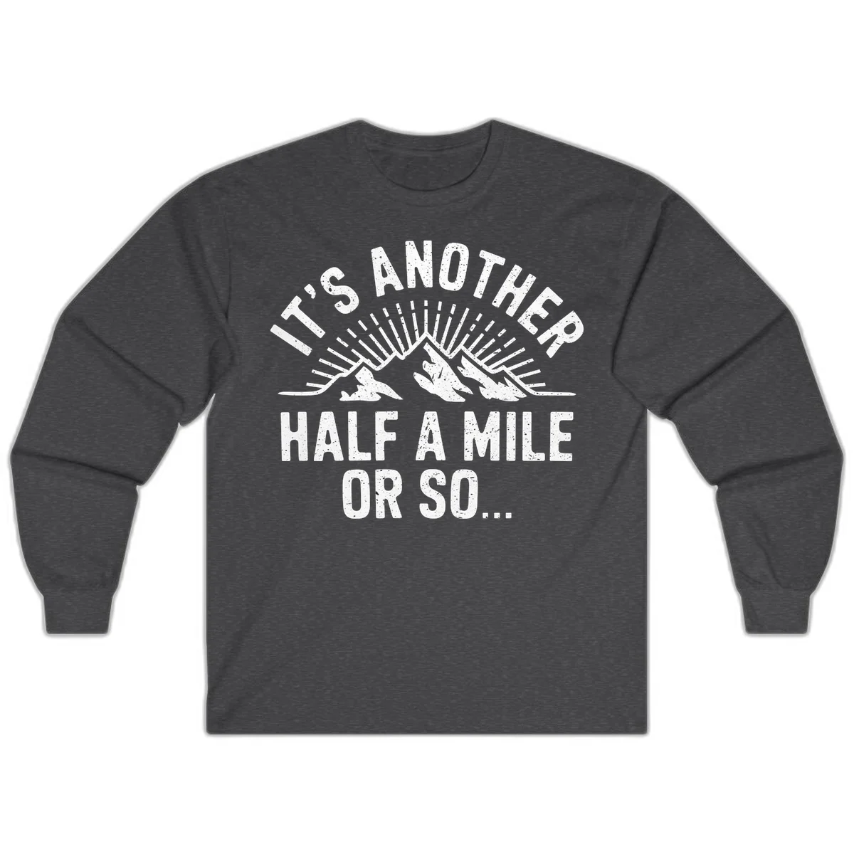 Retro distressed design with mountain peaks and sun rays, text reads 'It's Another Half A Mile Or So' - humorous hiking and camping artwork in Dark Heather