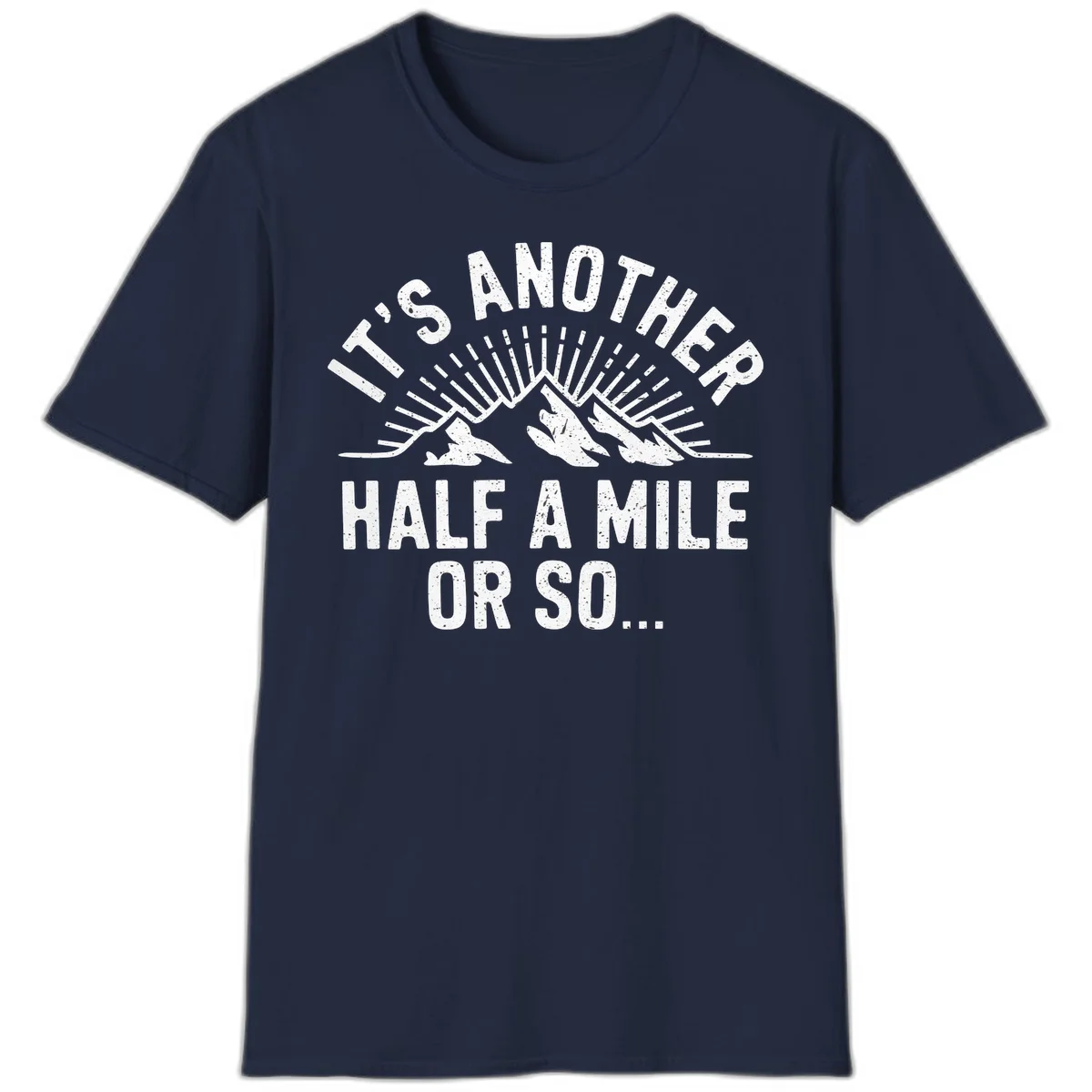 Retro distressed design with mountain peaks and sun rays, text reads 'It's Another Half A Mile Or So' - humorous hiking and camping artwork in Navy