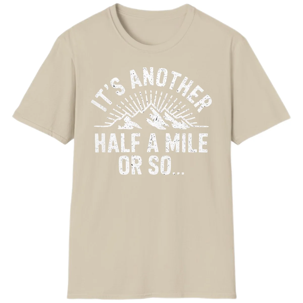 Retro distressed design with mountain peaks and sun rays, text reads 'It's Another Half A Mile Or So' - humorous hiking and camping artwork in Sand