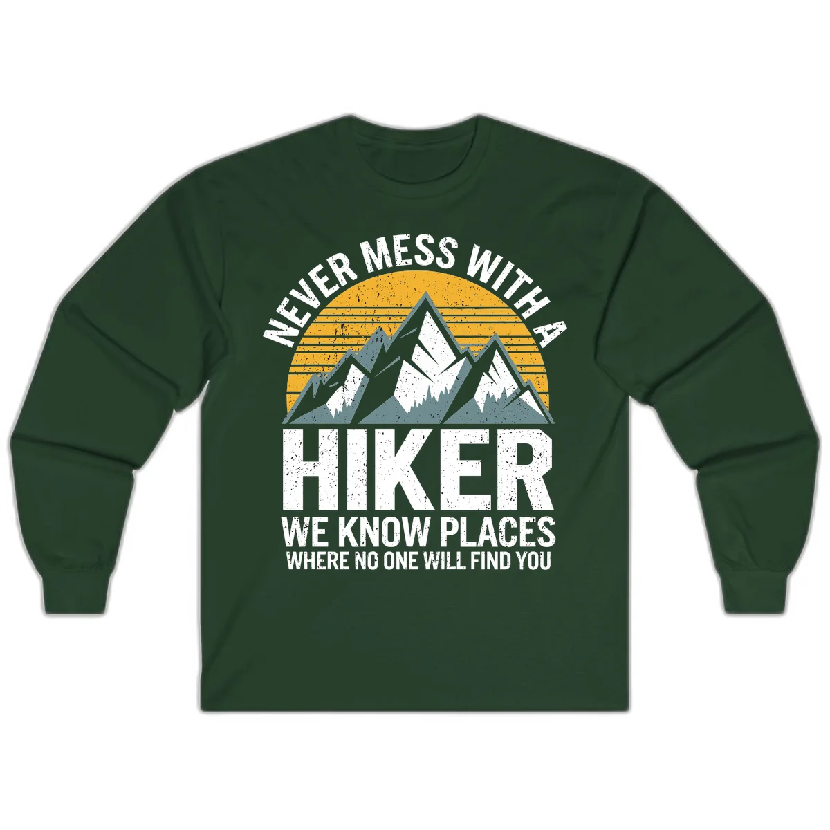 Vintage-style design with snow-capped mountains and forest silhouette against striped sunset, text reads 'Never Mess With A Hiker We Know Places Where No One Will Find You' in Forest Green