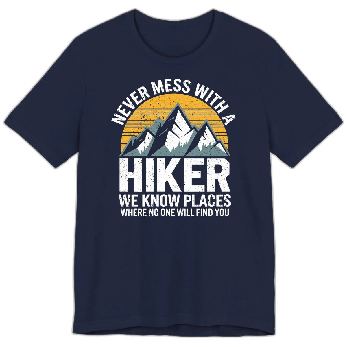 Vintage-style design with snow-capped mountains and forest silhouette against striped sunset, text reads 'Never Mess With A Hiker We Know Places Where No One Will Find You' in Navy