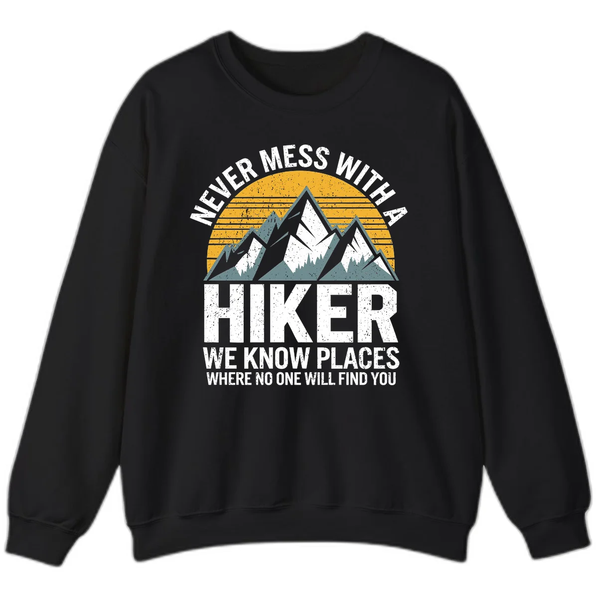 Vintage-style design with snow-capped mountains and forest silhouette against striped sunset, text reads 'Never Mess With A Hiker We Know Places Where No One Will Find You' in Black