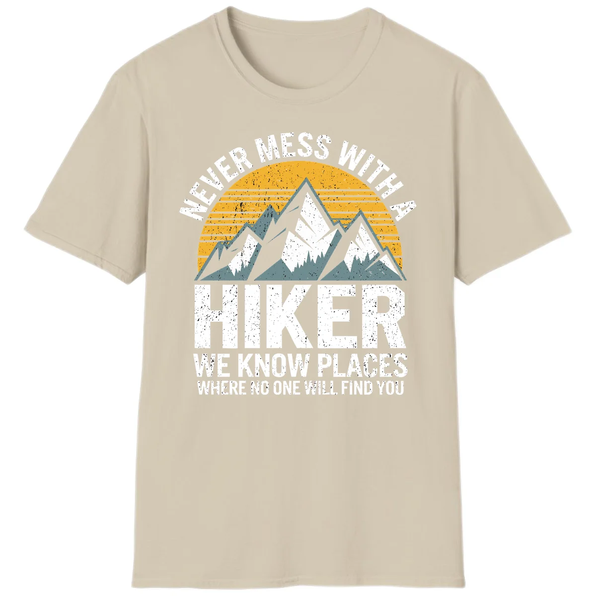 Vintage-style design with snow-capped mountains and forest silhouette against striped sunset, text reads 'Never Mess With A Hiker We Know Places Where No One Will Find You' in Sand