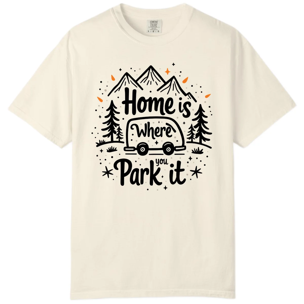 Illustrated winter camping scene with travel trailer, mountains, trees, and snowflakes with text 'Home is Where you Park it' in Ivory