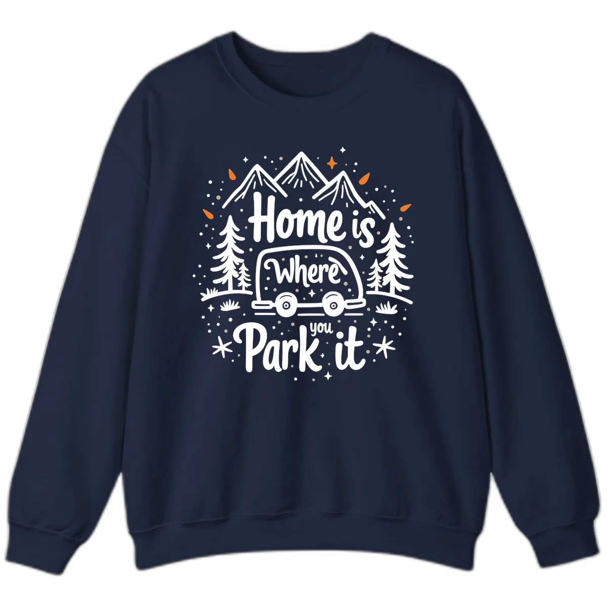 Illustrated winter camping scene with travel trailer, mountains, trees, and snowflakes with text 'Home is Where you Park it' in Navy