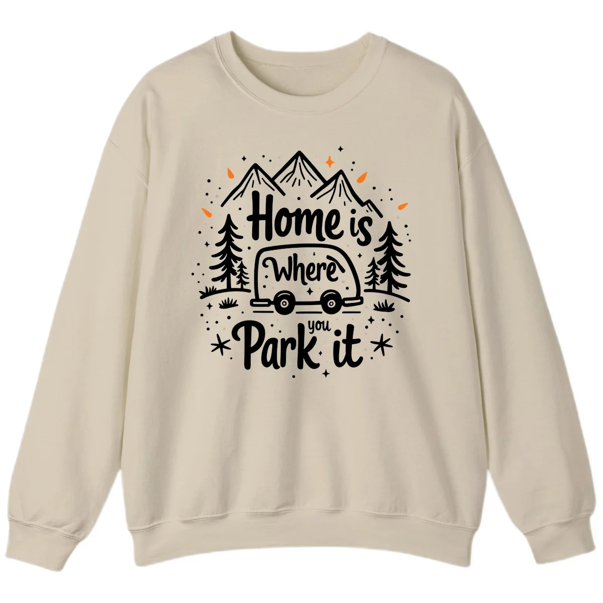 Illustrated winter camping scene with travel trailer, mountains, trees, and snowflakes with text 'Home is Where you Park it' in Sand