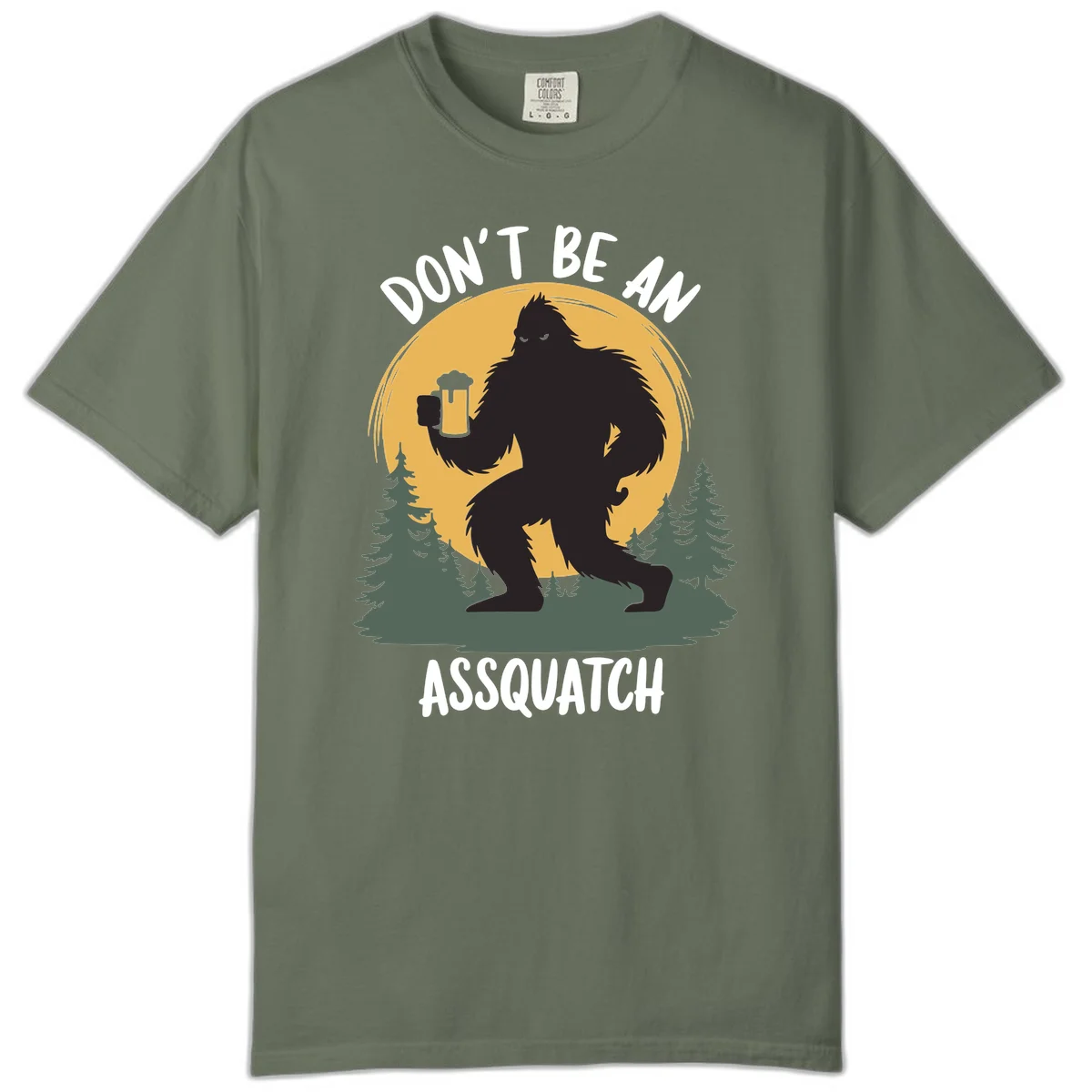 Black silhouette of Bigfoot holding a beer mug under a full moon with pine trees, text reads don't be an assquatch in Moss