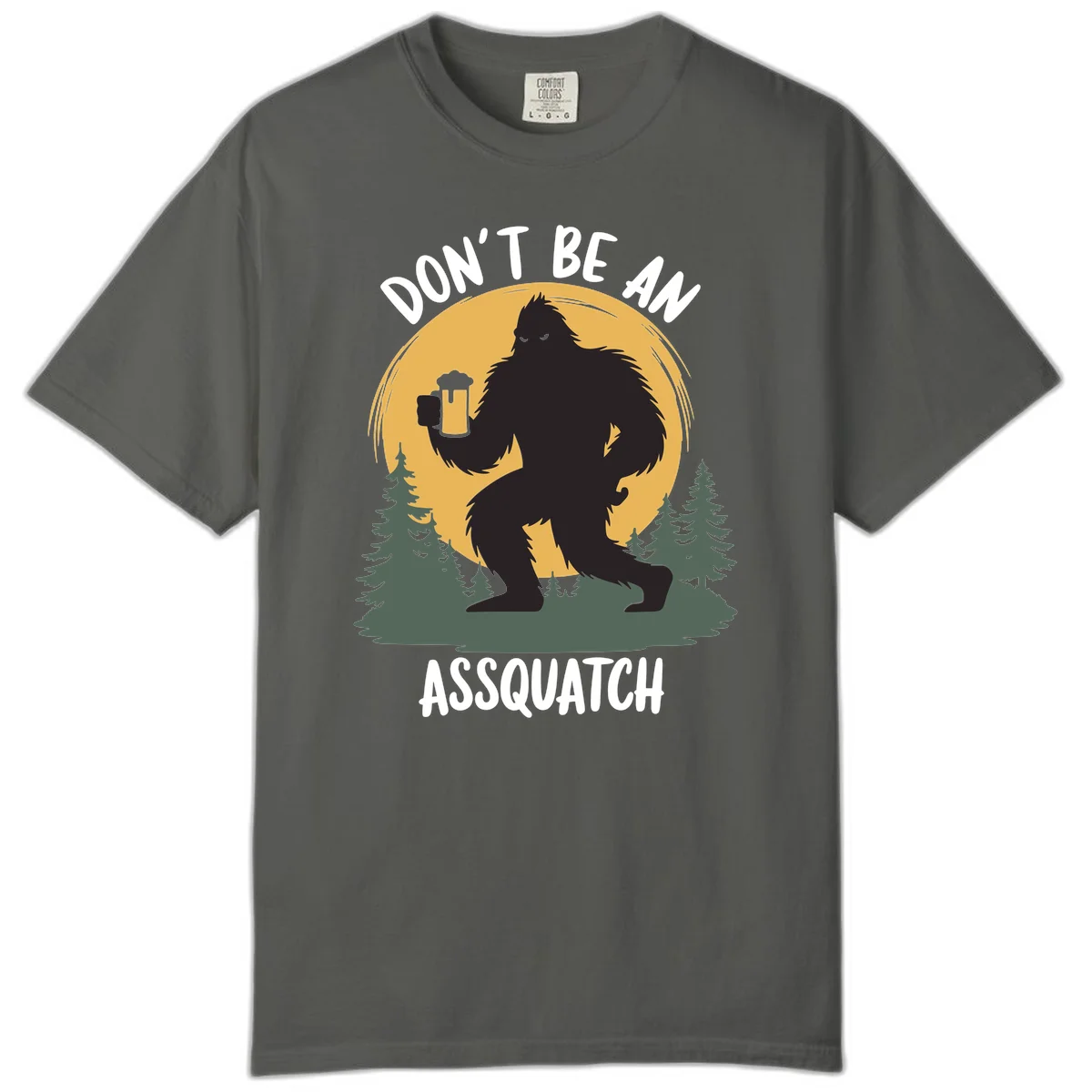 Black silhouette of Bigfoot holding a beer mug under a full moon with pine trees, text reads don't be an assquatch in Pepper