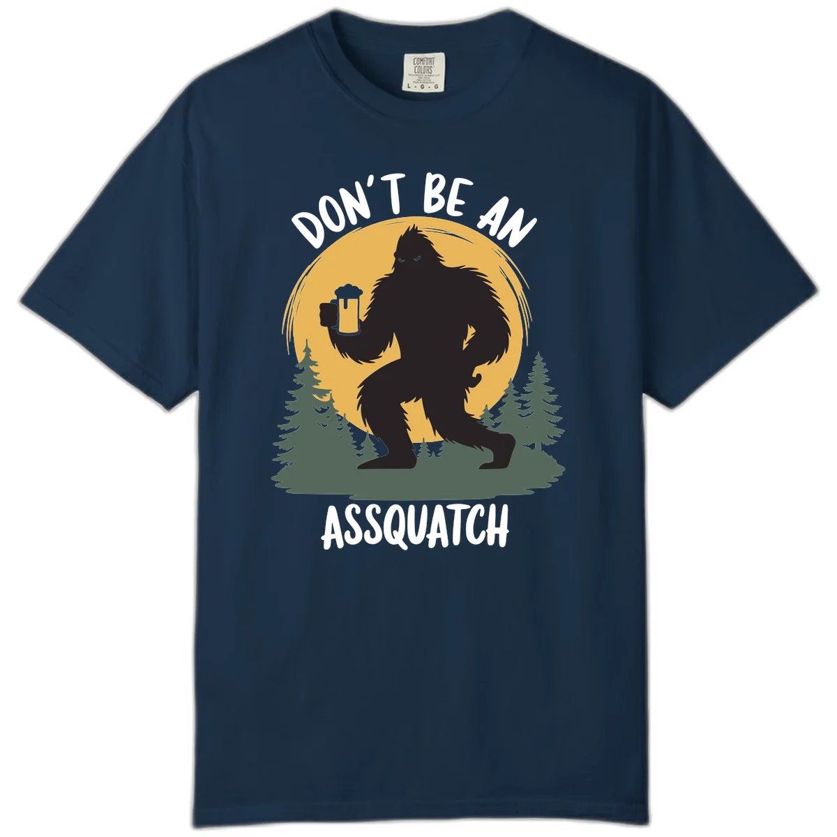 Black silhouette of Bigfoot holding a beer mug under a full moon with pine trees, text reads don't be an assquatch in True Navy