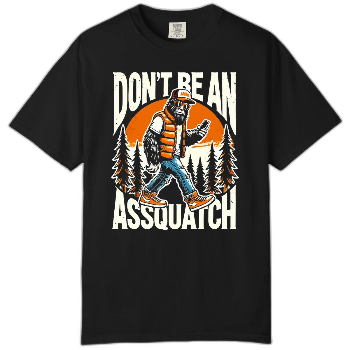 Cartoon sasquatch in hiking gear with backpack and smartphone, 'Don't Be An Assquatch' text, forest and orange sun background. in Black